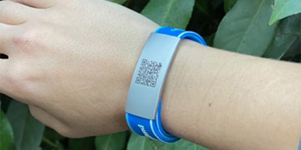 Instead of carrying your physical ID card around with you, this band allows you to upload it onto a site so that you can access it through a QR code going forward. 